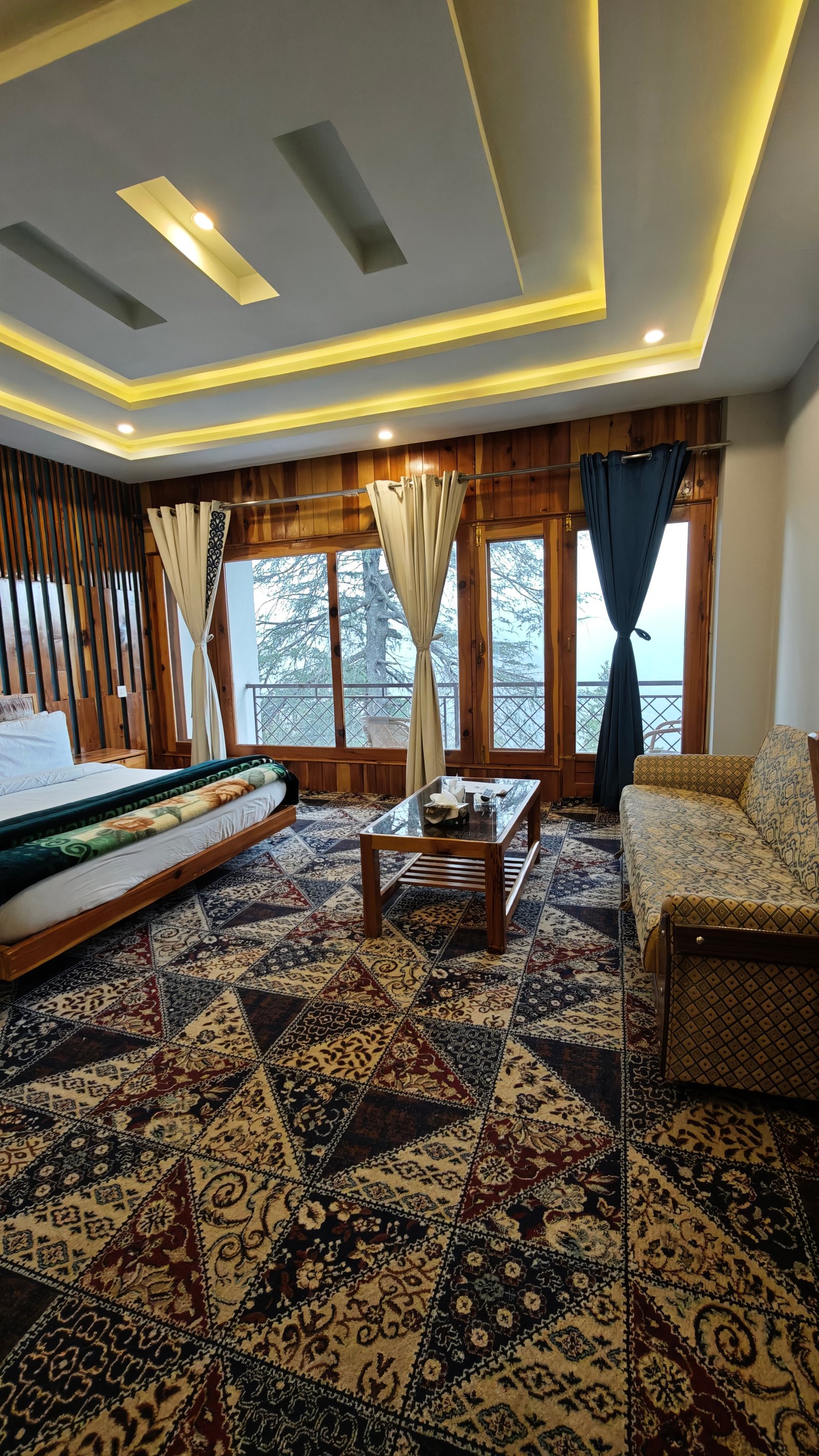 VIP Room interior Pine Park Shogran VIP Room interior photo with bed and window